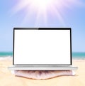 Laptop on beach Royalty Free Stock Photo