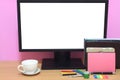 Laptop blank screen and books are placed on the desk and have co Royalty Free Stock Photo