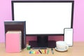 Laptop blank screen and books are placed on the desk and have co Royalty Free Stock Photo