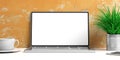 Laptop with blank screen and books on a white desk. 3d illustration Royalty Free Stock Photo