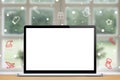 Laptop with blank screen on new year background Royalty Free Stock Photo