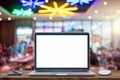 Laptop with blank screen on table Royalty Free Stock Photo