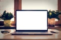 Laptop with blank screen on table Royalty Free Stock Photo