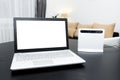 Laptop with blank screen and wireless internet router