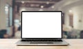 Laptop blank screen on wood table with coffee cafe background Royalty Free Stock Photo