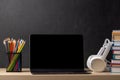 Laptop, books and pencils on desk Royalty Free Stock Photo