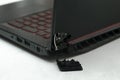 Laptop is broken with arm hinge on the screen,laptop cover,repair loop. cracked plastic laptop split case. computer