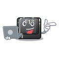 With laptop button f12 on a keyboard mascot Royalty Free Stock Photo