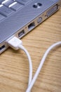 Laptop & cable Royalty Free Stock Photo