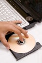 Laptop with CD in the tray Royalty Free Stock Photo