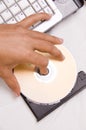Laptop with CD in the tray Royalty Free Stock Photo