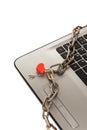 The laptop is in chains and a beautiful red closed lock. Limited access to data. Adult site Royalty Free Stock Photo