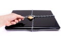 Laptop with chains and padlock.