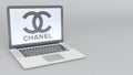 Laptop with Chanel logo. Computer technology conceptual editorial 3D rendering