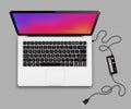 Laptop with charger Royalty Free Stock Photo