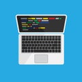 Laptop with code on the monitor screen top view. Royalty Free Stock Photo