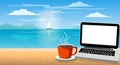 A laptop and a coffee cup on wood table in the sea beach background Royalty Free Stock Photo