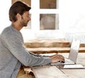 Laptop, coffee shop and remote work with blogger man typing article or content at table outdoor. Business, computer and Royalty Free Stock Photo