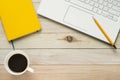 Laptop, coffee and yellow diary Royalty Free Stock Photo