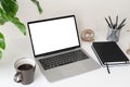 Laptop computer with blank screen for mockup on modern contemporary workspace desk with coffee cup and office supplies. Home Royalty Free Stock Photo