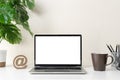 Laptop computer with blank screen for mockup on modern contemporary workspace desk with coffee cup and office supplies. Home Royalty Free Stock Photo