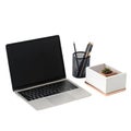 Laptop computer with desk accessories on white background notebook technology Royalty Free Stock Photo