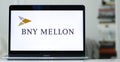 Laptop computer displaying the logo of BNY Mellon, an investment banking services company