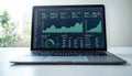 Laptop screen financial data graphs Royalty Free Stock Photo
