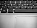 Laptop computer keyboard close up shot, shallow depth of field, copy space