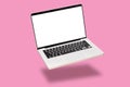 Laptop computer mock up with empty blank white screen isolated on pink background. float or levitate laptop notebook with shadow.