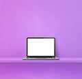 Laptop computer on purple shelf. Square background Royalty Free Stock Photo