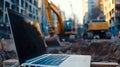 A laptop computer sitting on top of a construction site Royalty Free Stock Photo