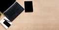 Laptop computer, tablet computer, and mobile phone blank screen on wood table background, mockup, template for your text, Royalty Free Stock Photo