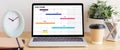Laptop computer with timeline project schedule, work plan mangement, on table work with copy space Royalty Free Stock Photo