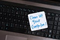 Laptop Computer on wooden table with note CLEAN UP YOUR COMPUTER Royalty Free Stock Photo