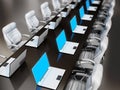 Laptop computers standing on boardroom table