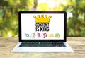 laptop with content is king data on table Royalty Free Stock Photo