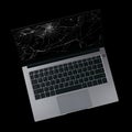 laptop with cracked screen isolated on black background Royalty Free Stock Photo