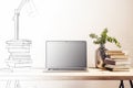 Laptop on desk with plant in vase, books, lamp, concept of modern home office, neutral background.
