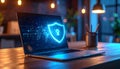 Laptop with digital cybersecurity shield on screen Royalty Free Stock Photo