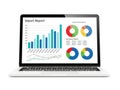 Laptop displaying business report graphs and charts isolated on white background Royalty Free Stock Photo