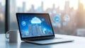laptop displaying cloud technology concepts with city skyline in background image conveys innovation and connectivity in modern Royalty Free Stock Photo