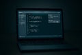 Laptop displaying code editor with simple compose interface on screen, coding and programming at night. concept of software Royalty Free Stock Photo