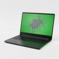 Laptop displaying a green screen with a complex black data visualization pattern Royalty Free Stock Photo