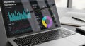 Laptop displaying a marketing dashboard with Royalty Free Stock Photo