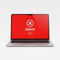 A laptop displaying a red error screen with a large white cross symbol and text Royalty Free Stock Photo