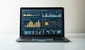 Laptop displaying data visualizations charts and graphs for business analysis Royalty Free Stock Photo