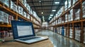 Laptop displays inventory management software. Warehouse shelves filled with goods. Tech solution for supply chain. Efficient Royalty Free Stock Photo