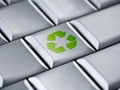 Recycle logo on a computer keyboard Royalty Free Stock Photo