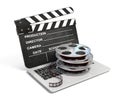 Laptop with films reel and movie clapper, Video or movie online internet concept 3d rendering Royalty Free Stock Photo